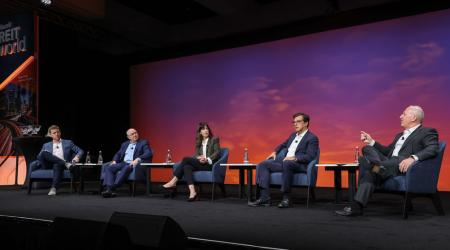 2023 REITworld lunch panel onstage  REITs Seen Making Gains in 2024, Although Challenges Remain:  REITworld General Session REITs Seen Making Gains in 2024 Although Challenges Remain REITworld
